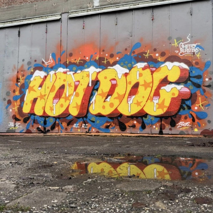 Graffiti art on a wall with the word 'HOTDOG' in bright colors.